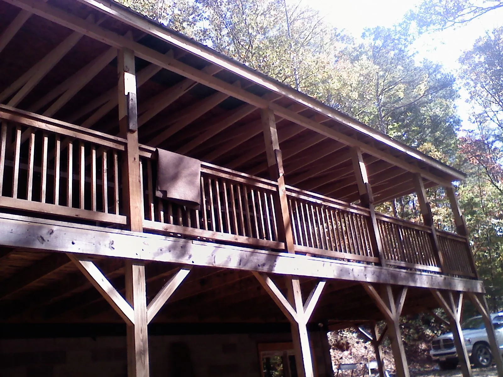 Timber framing under a new elevated porch and deck — Roof Leak Repair in Whitman by Roofing Brothers